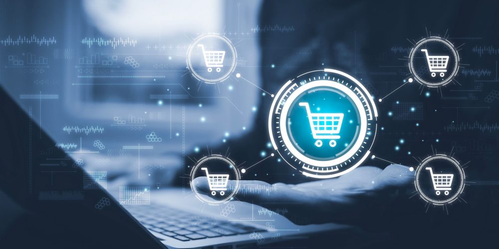 Businessmen using a laptop with online shopping concept, marketplace website with virtual interface of online Shopping cart part of the network, Online shopping business with selecting shopping cart.